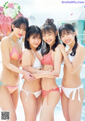 A group of three young women posing for a picture.