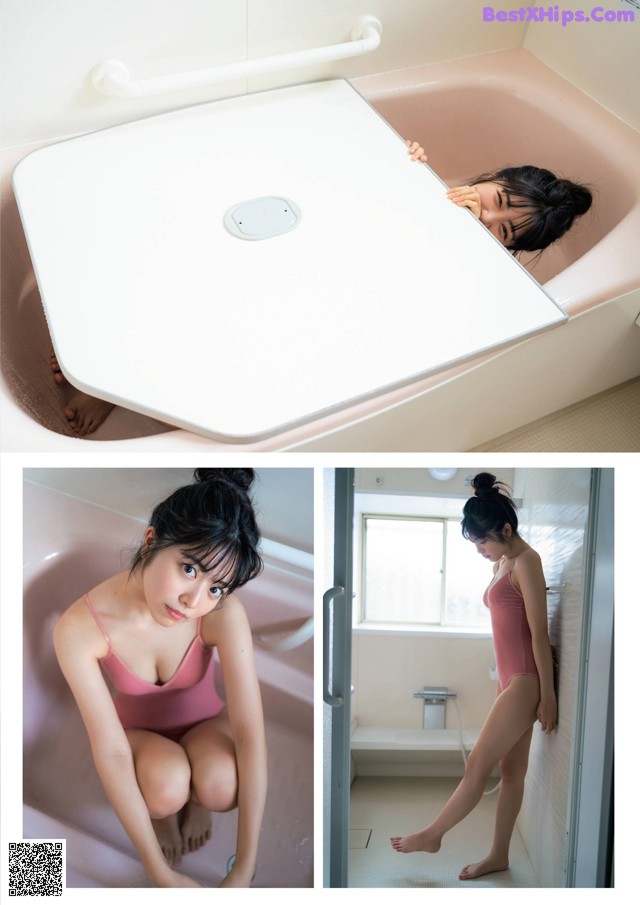 A woman in a pink bathing suit sitting in a bathtub.