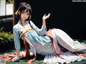 A woman in a white kimono sitting on a bed.
