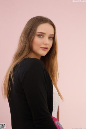 A young woman in a white underwear posing for the camera.